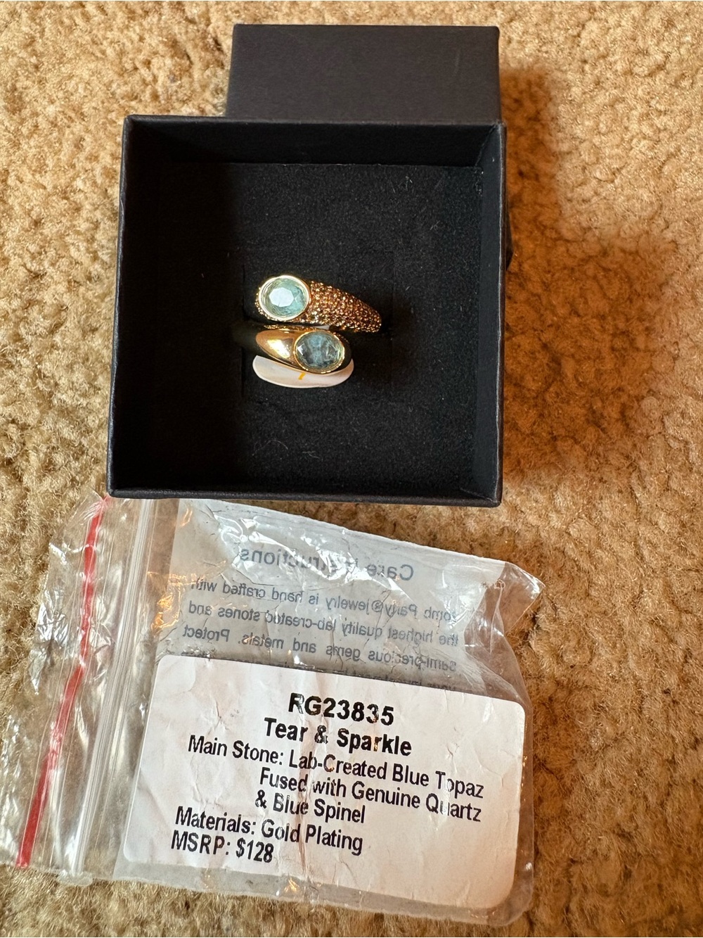 Tear & Sparkle Gold-Plated Ring with Blue Topaz Accent